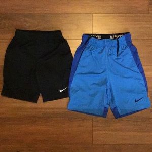 Two Nike athletic shorts.